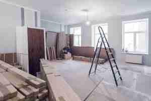 Room underconstruction with boxes & furniture