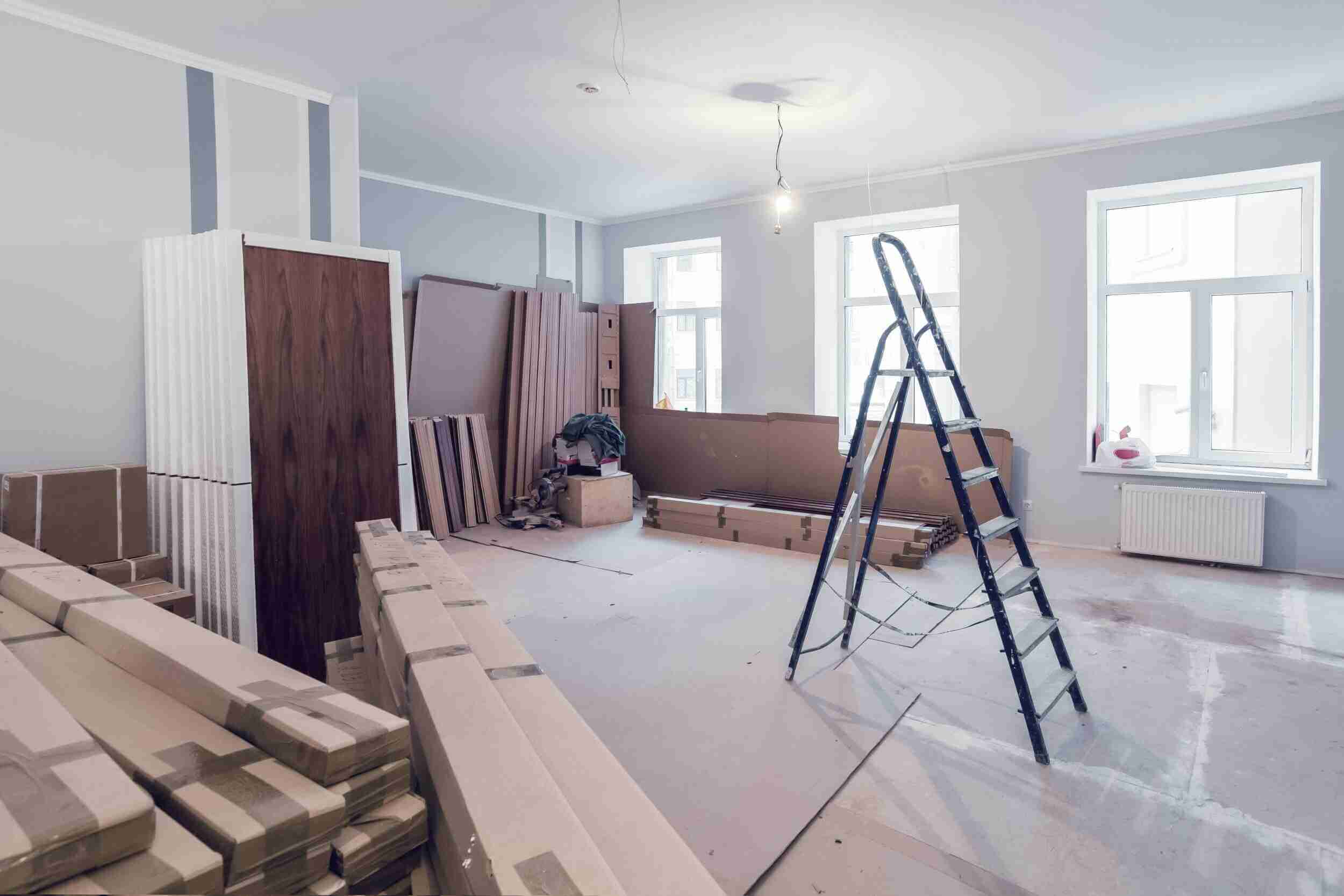Room underconstruction with boxes & furniture