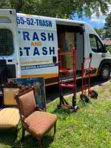 Furniture outside truck after being cleared out